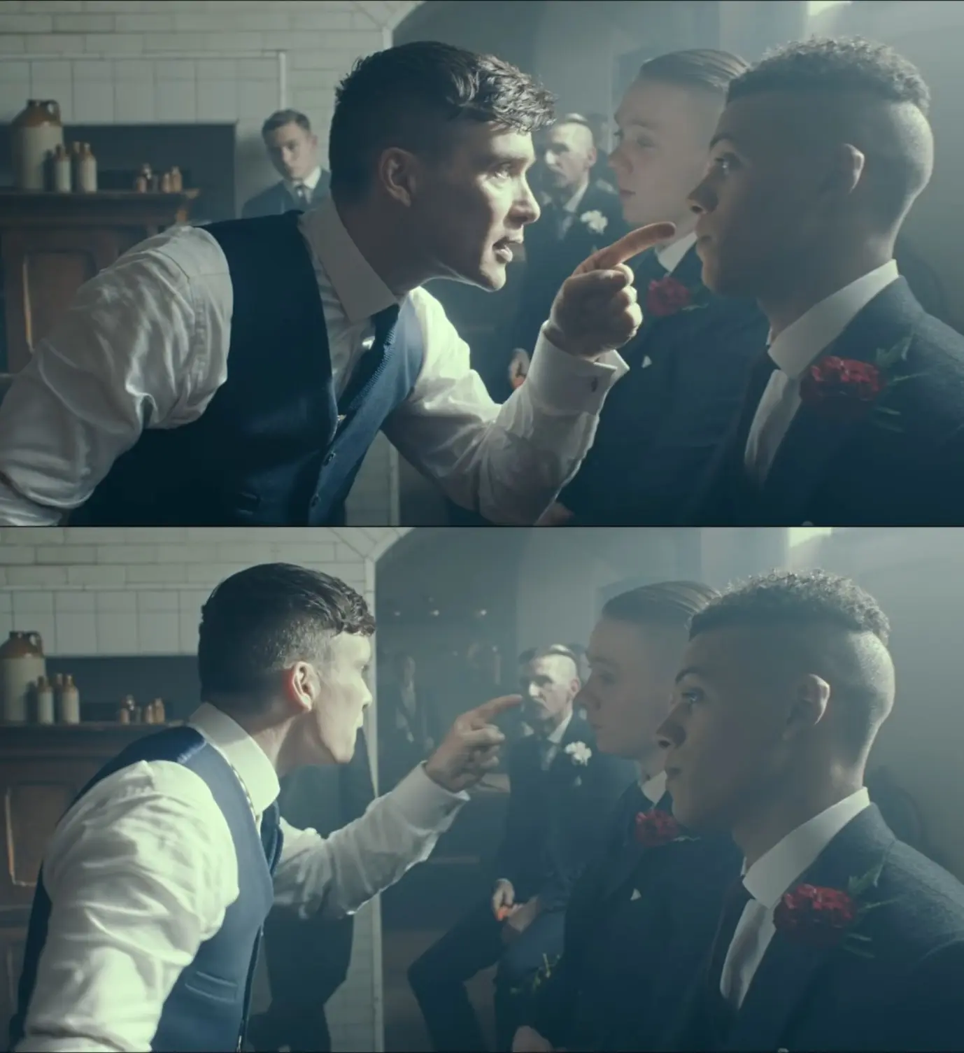 Thomas Shelby from Peaky Blinders, pointing angrily at a row of other men.