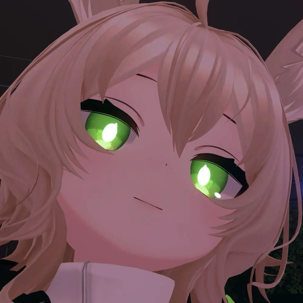 ari's profile picture, a render of a blonde bunnygirl with shoulder-length hair and bright, green eyes. she's staring down a little towards the viewer, smiling slightly. she appears to be wearing some kind of white jacket with a tall neck, and the rest is out of frame.